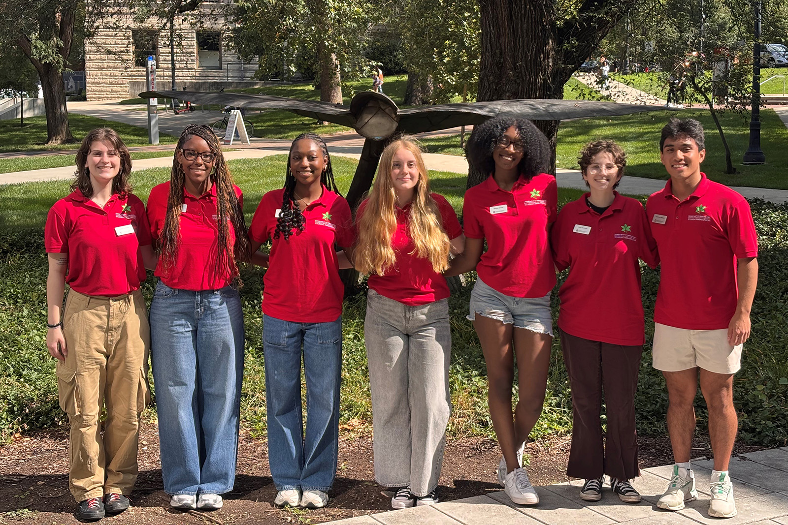 7 Psychology ambassadors standing outside Psychology building