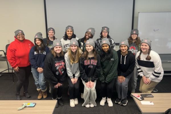Group of students wearing beanies