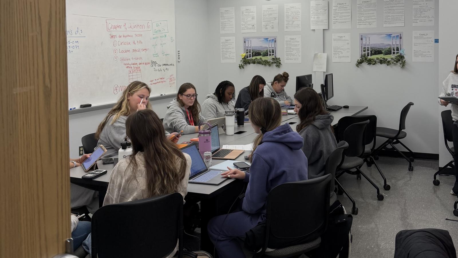 Students working on computers together